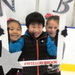 Willowbrook Ice Arena youth figure skaters holding up Willowbrook frame