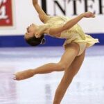 Figure skater in yellow